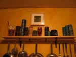 In the kitchen, Tiki mugs lurk and scowl!