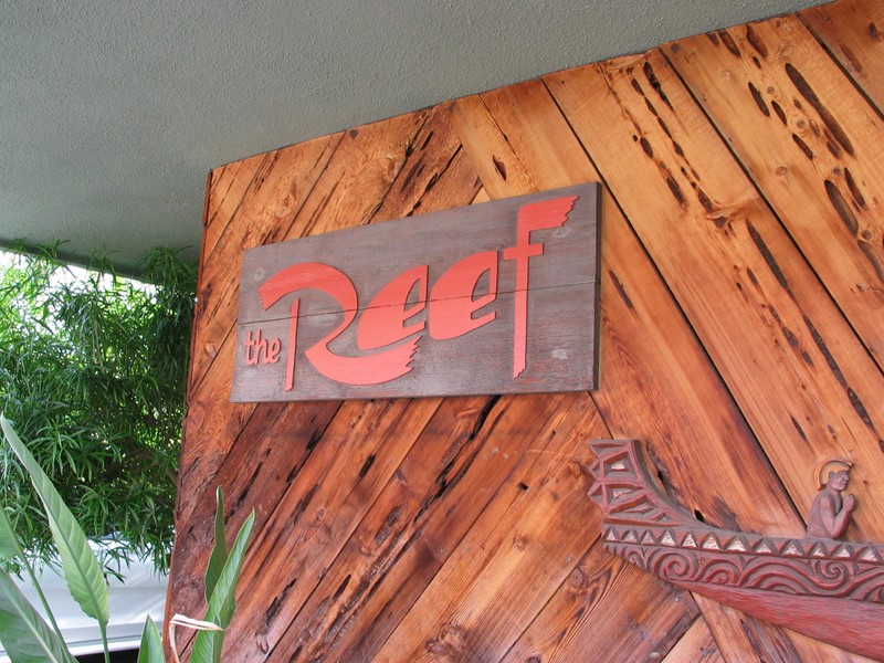 The sign on the side of the building for the Reef.