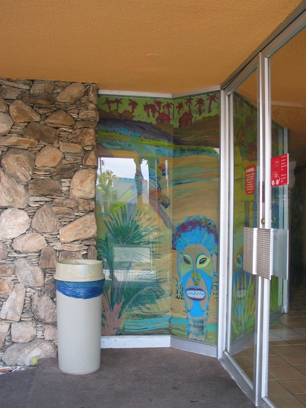 Stepping outside the building for just a moment, this is across from the lobby at the entrance to La Casita. You can see the Outrigger's edge of the mural from outside.