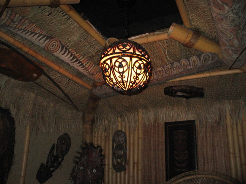 Facing the back left corner of the chieftan's hut, and the wonderful old original lamp.