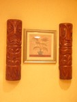 The Tikis in the lobby hall we glimpsed through the screen a moment ago.