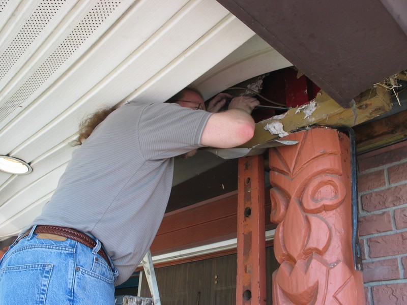 Getting in the roof, we find 2 large bolts and several thick nails holding the Tikis in place.