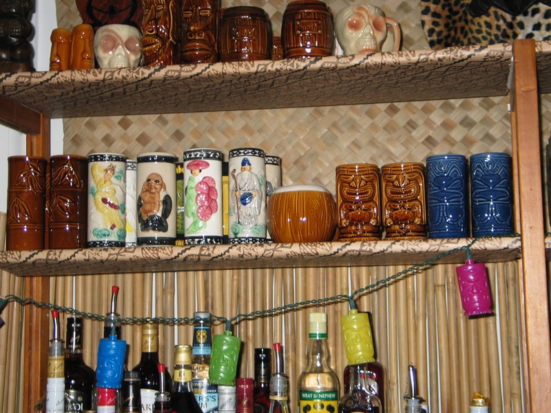 This shelf is everday mugs I serve drinks in. Up top, you can catch a glimpse of my Kahiki mugs.