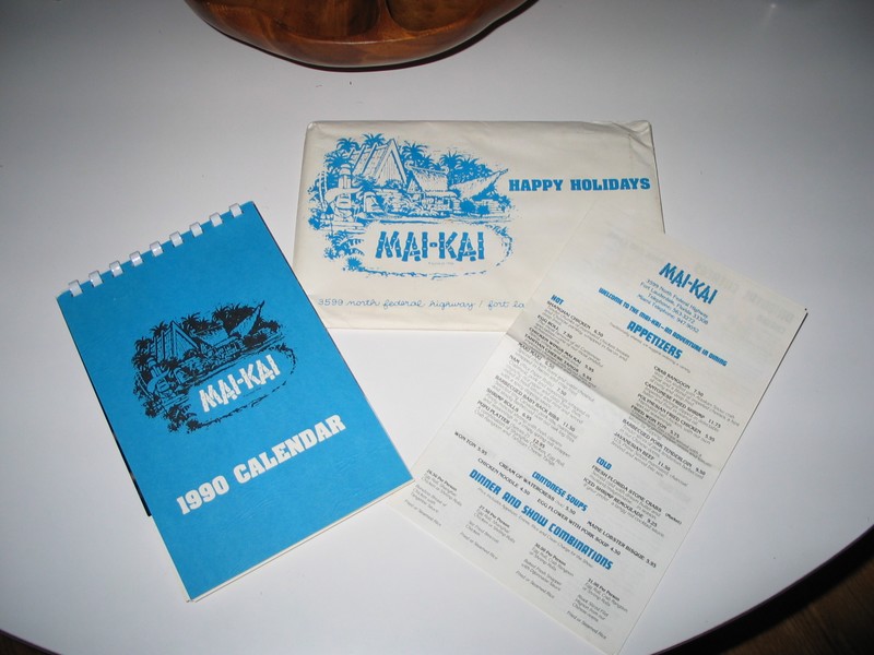 The way Mai Kai Calendars are sent out; left- the calendar itself, middle- the envelope, right- a micro menu.