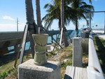 Yup, that's fearless globe traveling green guy, Shecky- Tiki Central's mascot mug, taking in the sights. The old bridge is to the right. Route 1 is to the left. We're facing Southwest- towards Key West.