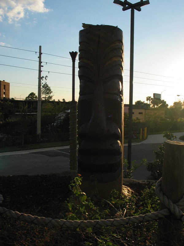 Front view of a large Tiki, we're facing I-4 right now, but Tiki Island isn't very visible from the highway- it might be when the Volcano goes off, but we never quite got that timing right to check.