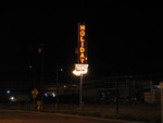 Unrelated, but nearby, one can also find the Holiday's signage like a beacon in the night.