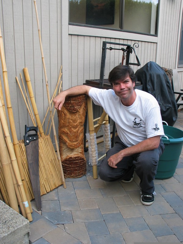 Outside, Unga Bunga poses with his Crazy Al Tiki. He has serious plans for that pile of bamboo to the left. I can't wait to see!