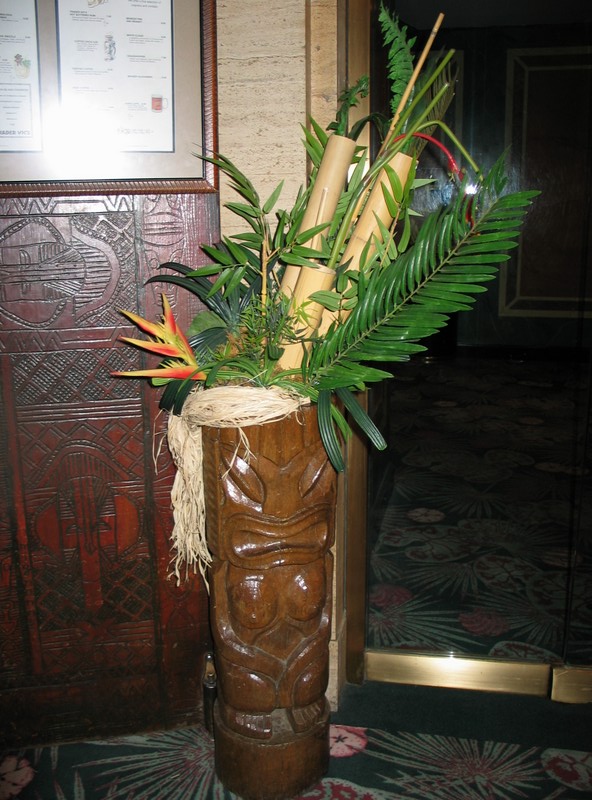 A close up of that happy Tiki. Also notice the carvings on the door.