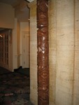 Down the corridor, closer to the restaurant, a fine carving.
