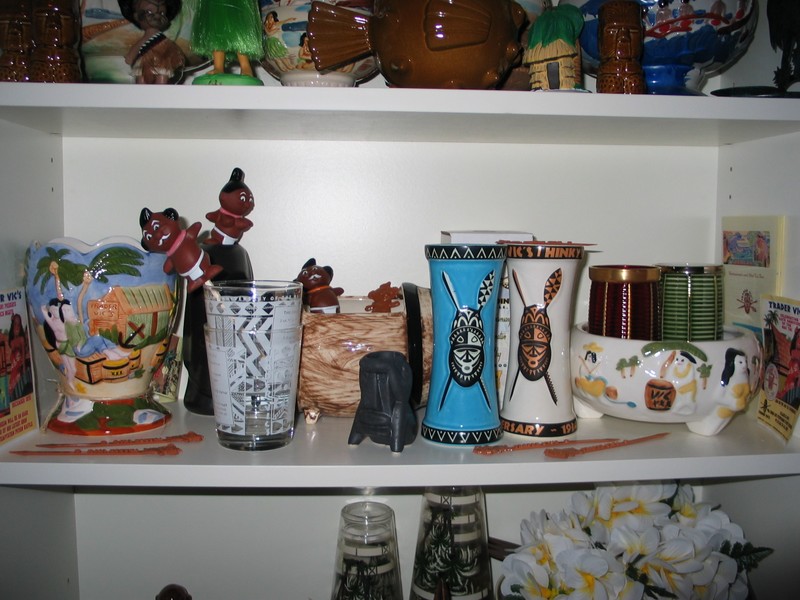 My new homage to Trader Vic shelf, with many goodies from TV's in Atlanta.