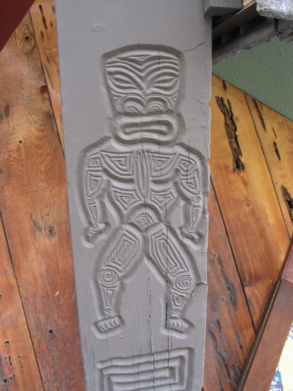 Carved into the Reef's A-Frame, you'll find these happy little fellows, one on each side.