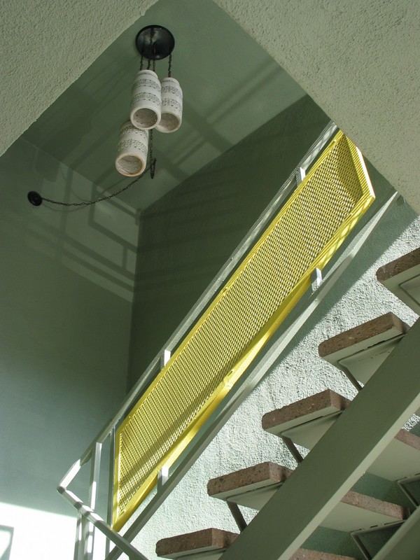 Now all the way back out, next to the Tiki hut and the lobby, there's a small stairway with good lamps hanging.