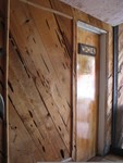 Now inside the Reef A-Frame. The rustic wood walls continue and the signage is carved.