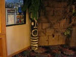 The odd left hand Tiki from the Fireplace with crossed hands and white paint.